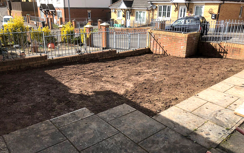 Garden dug up for stone covering